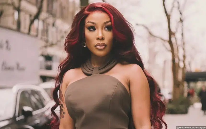 K. Michelle and Dr. Kastan Sims dancing together at an event